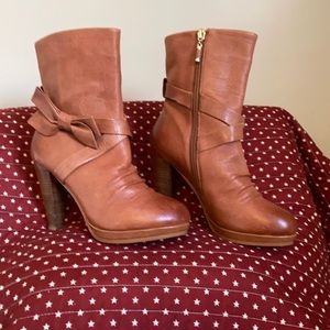 Tan mid-calf leather boots. NWOT